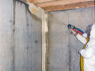 Spray-applied polyurethane foam on basement walls